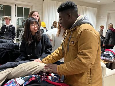Students organized the distribution of winter coats as cold weather began to settle in over Georgia.