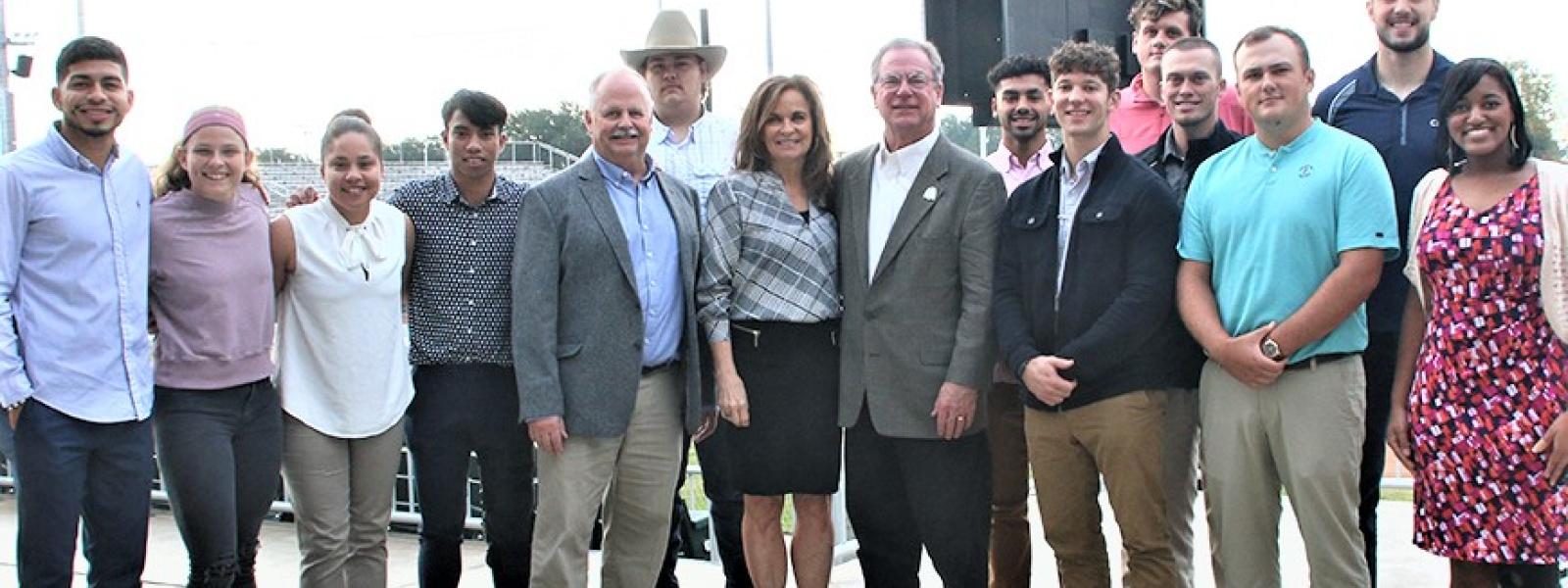 CIU Sport Management majors pose after the Mayor's Prayer Breakfast with their program director Dr. Wayne Rasmussen and Bill and Vicki Shanahan, owners and operators of the Lexington County Blowfish. 