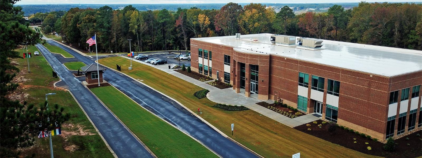 The William H. Jones Global Business & IT Center stands at the entrance to CIU just off Monticello Road