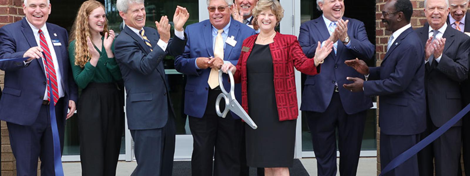 Lyn Cook cuts the ribbon on the John and Lyn Cook School of Business located in the Jones Center. (Photos by Kierston Smith)