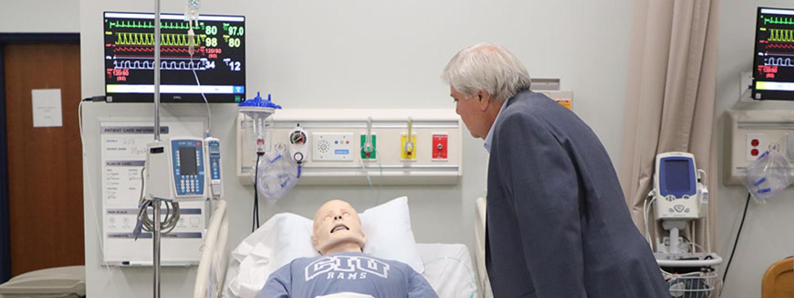A "patient" gets a visitor in the Simulation Room. (Photos by Kierston Smith)