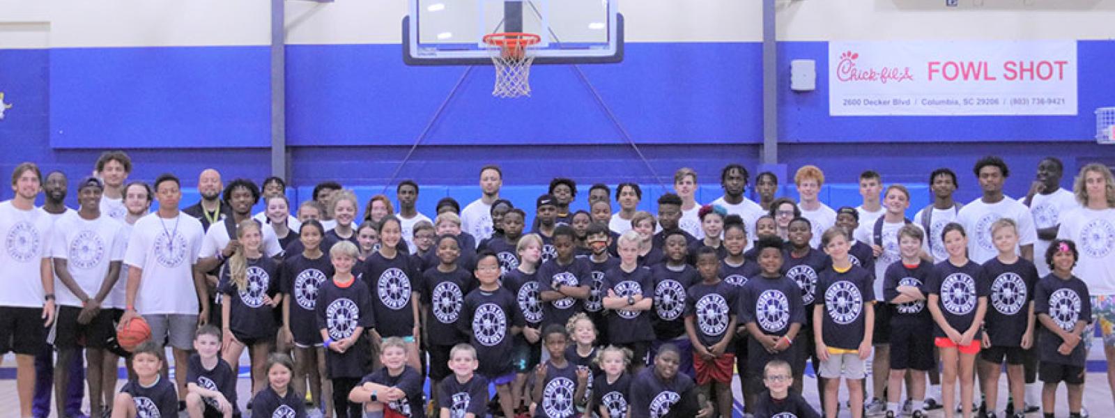 CIU basketball campers, players and coaches 