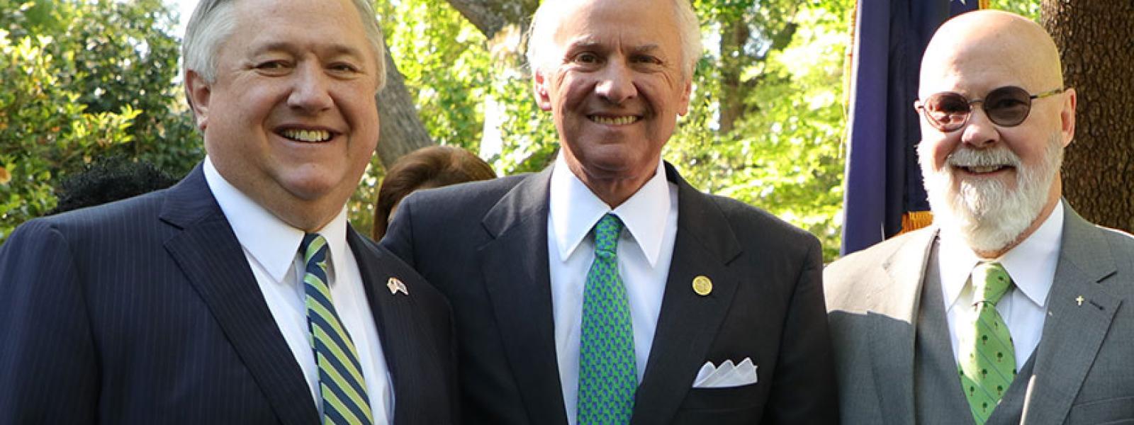 President Dr. Mark Smith (left) with SC Gov. Henry McMaster (center) and Tom Mullikin at the 2021 Earth Day commemoration in the garden of The Governor's Mansion. (Photo by Kierston Smith)