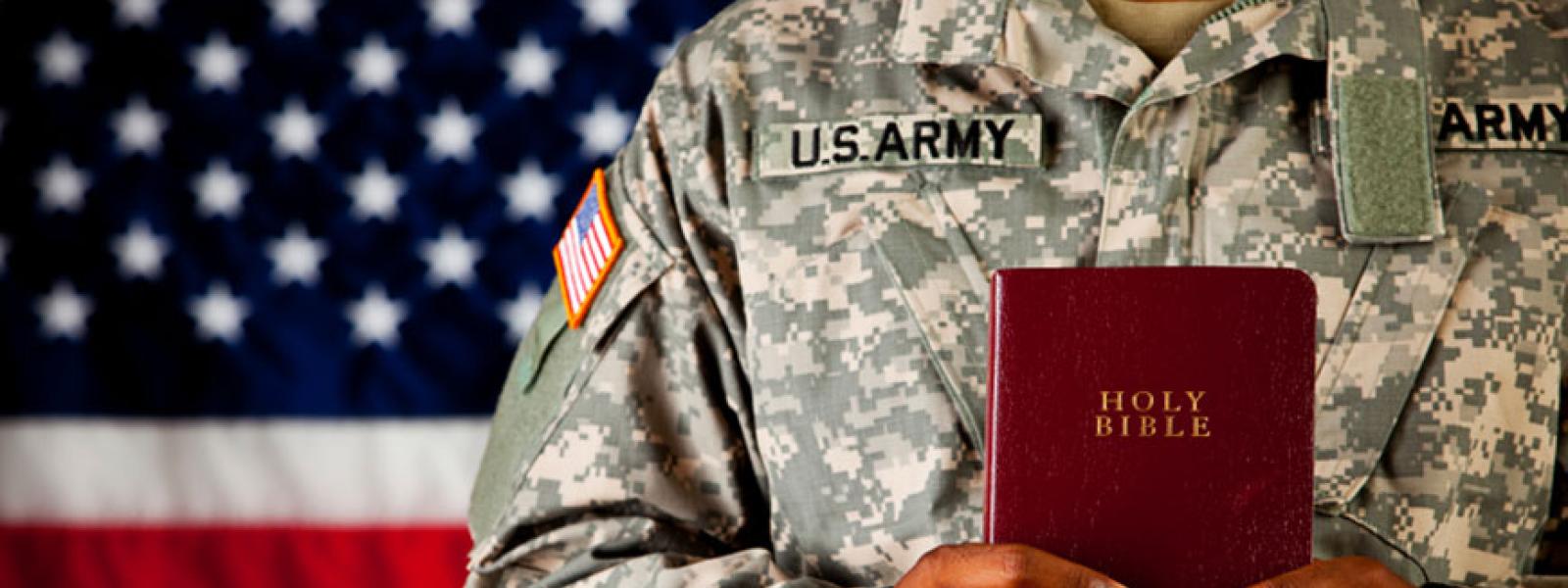 Soldier Black Holding Bible