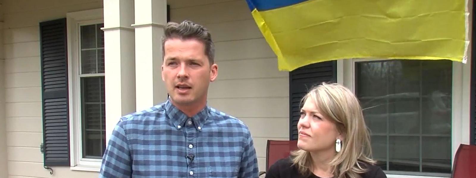 With a Ukrainian flag flying in the background, Pastor Andrew Moroz and his wife Samantha talk to ABC 13 WSET in Lynchburg, Virginia.