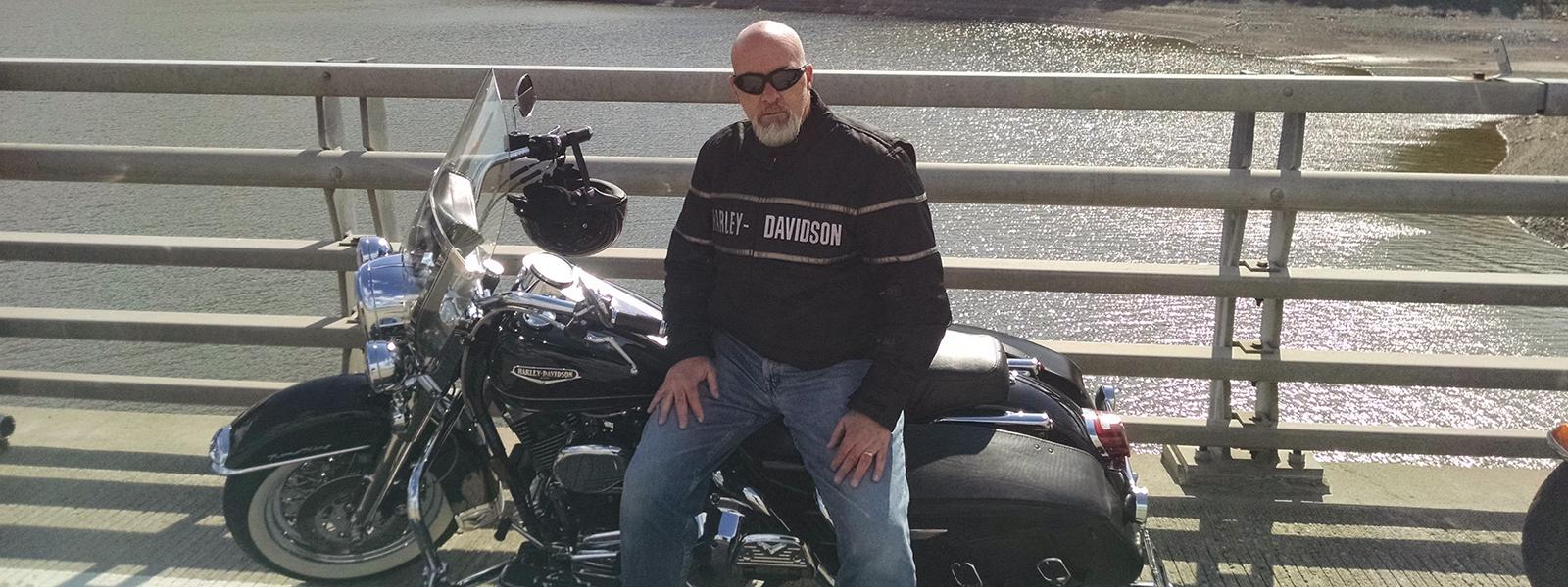 When he is not writing scholarly books, Dr. Stephen Davis relaxes with his Harley-Davidson. (Photo provided)
