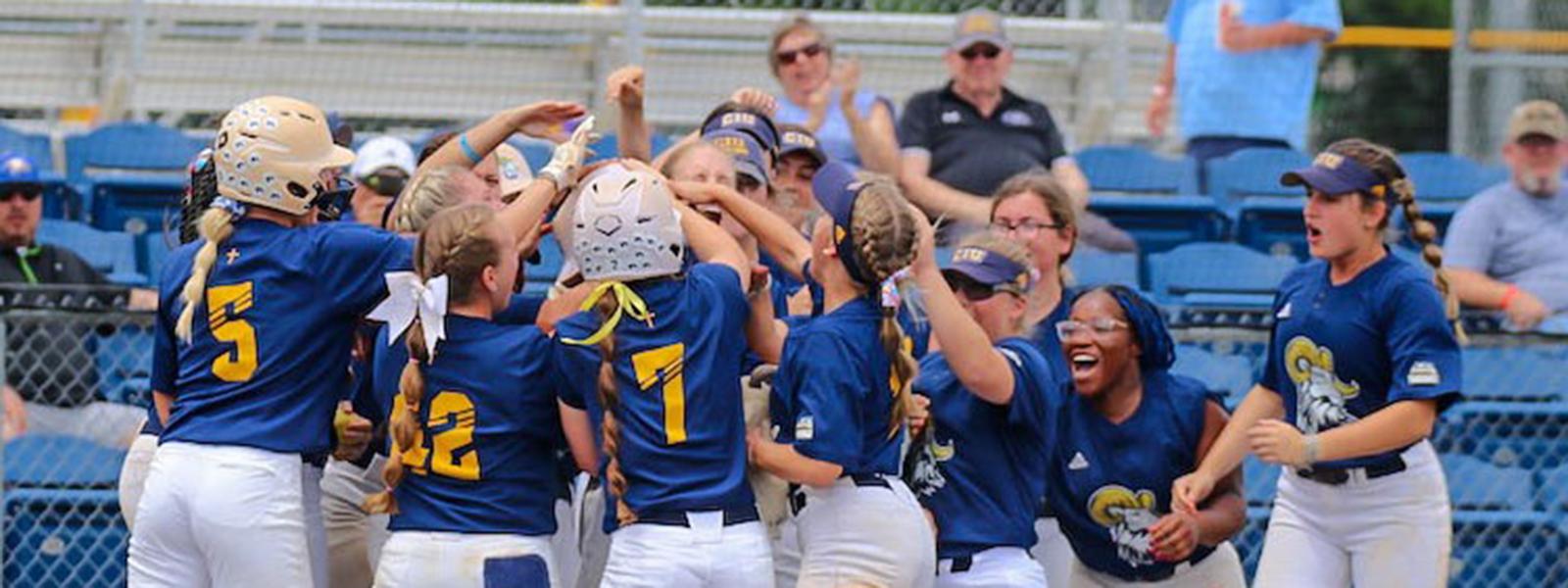 The Rams celebrate Lauren Baker's home run in the championship game. 