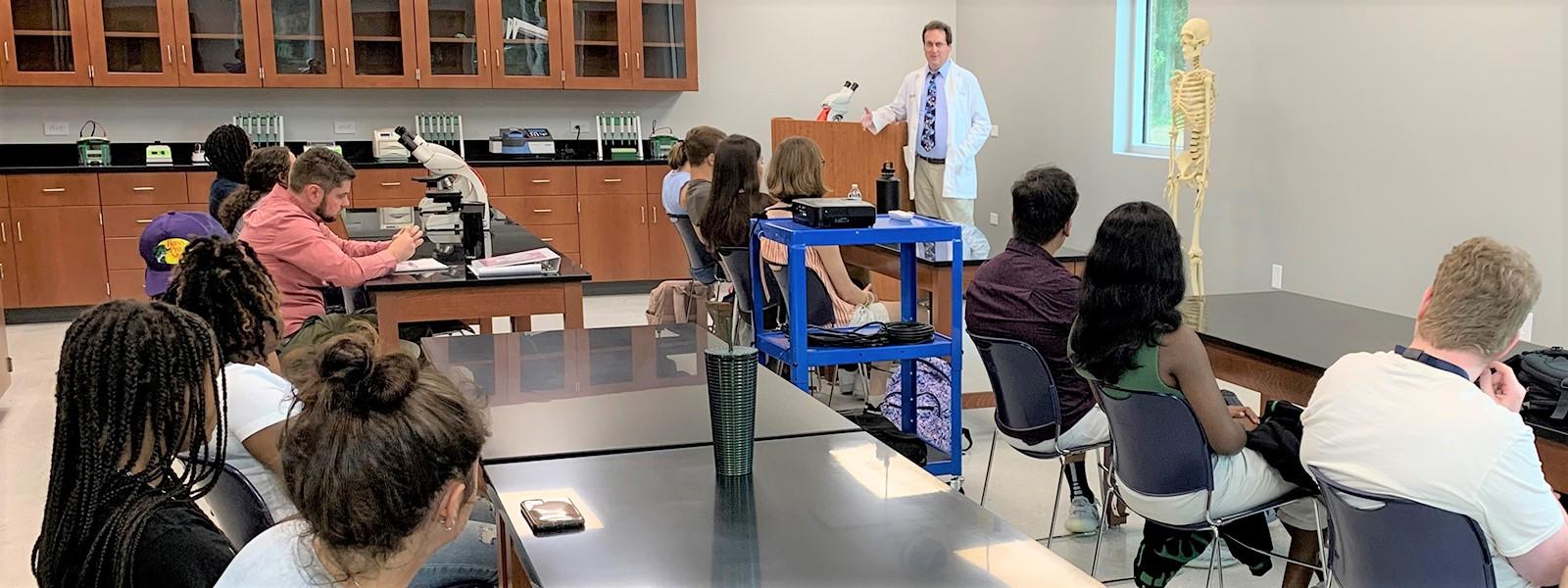 Dr. David DeWitt introduces the first lab students to Anatomy and Physiology class. 
