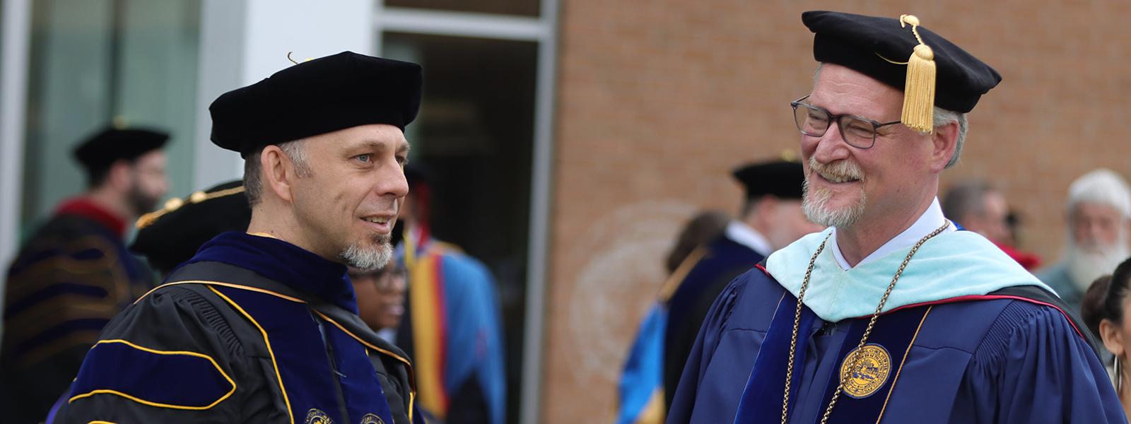 Dr. Luke Lundstedt with his POL mentor, CIU Interim President Dr. Rick Christman. (Photo by Kierston Smith) 