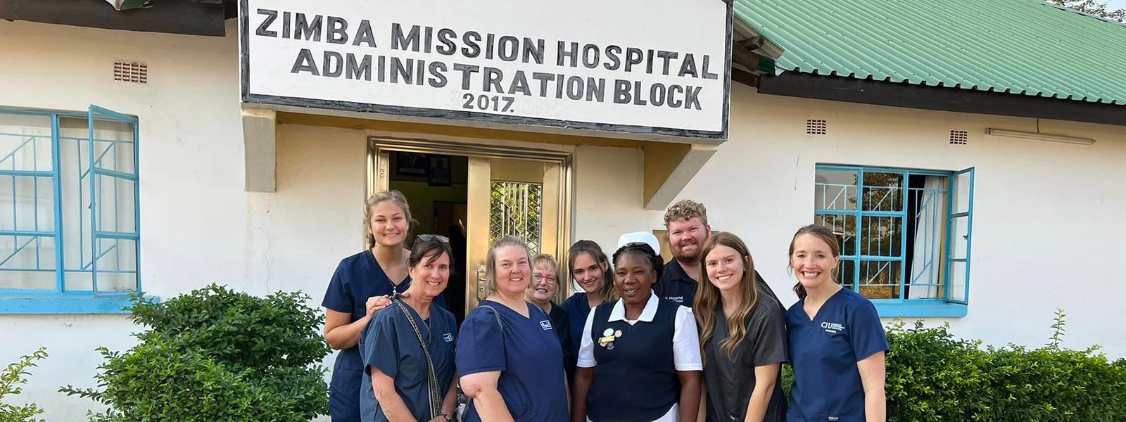 CIU Nursing students pose with staff outside a hospital in Zambia. (Facebook: Emily Woodard) 