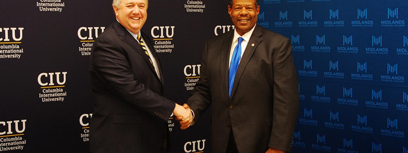 CIU President Dr. Mark Smith and Midlands Technical College President Dr. Ronald Rhames