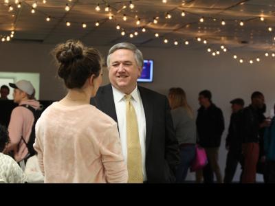 CIU President Dr. Mark Smith chats with students at a spring semester welcome event. (Photo by Kierston Smith)