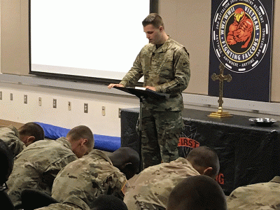 John Dabeck prays for the troops at Fort Jackson in Columbia. 