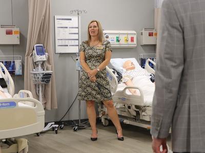 Dr. Jill McElheny offers a tour of the Skills Center. 