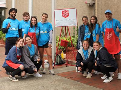"Kettles for Ukraine" Students ringing the Salvation Army bells in downtown Columbia.