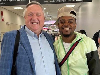 CIU President Dr. Mark Smith crossing paths with Pastor Travis Greene at the airport. 