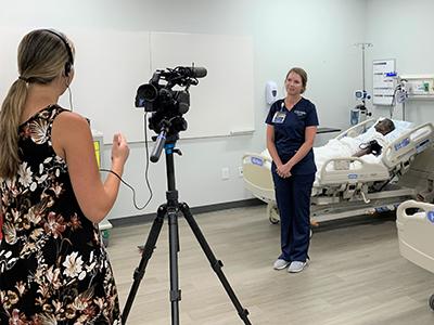 Nursing student Megan Pifer is interviewed for a feature about the CIU nursing program on WLTX TV in Columbia.