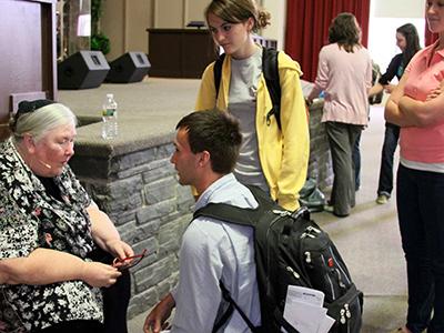 Sue Thomas chats with CIU students following a Chapel message. 