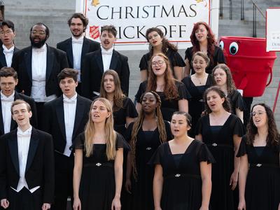 The CIU Ambassador Choir sings as the Salvation Army announces their Red Kettle Campaign for Christmas. (Photo by Noah Allard) 