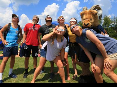 CIU students are joined by the Rams mascot on Sessions Field. (Photo by Seth Berry)