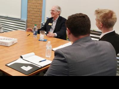 Former Krispy Kreme CEO James Morgan with CIU Business students. 